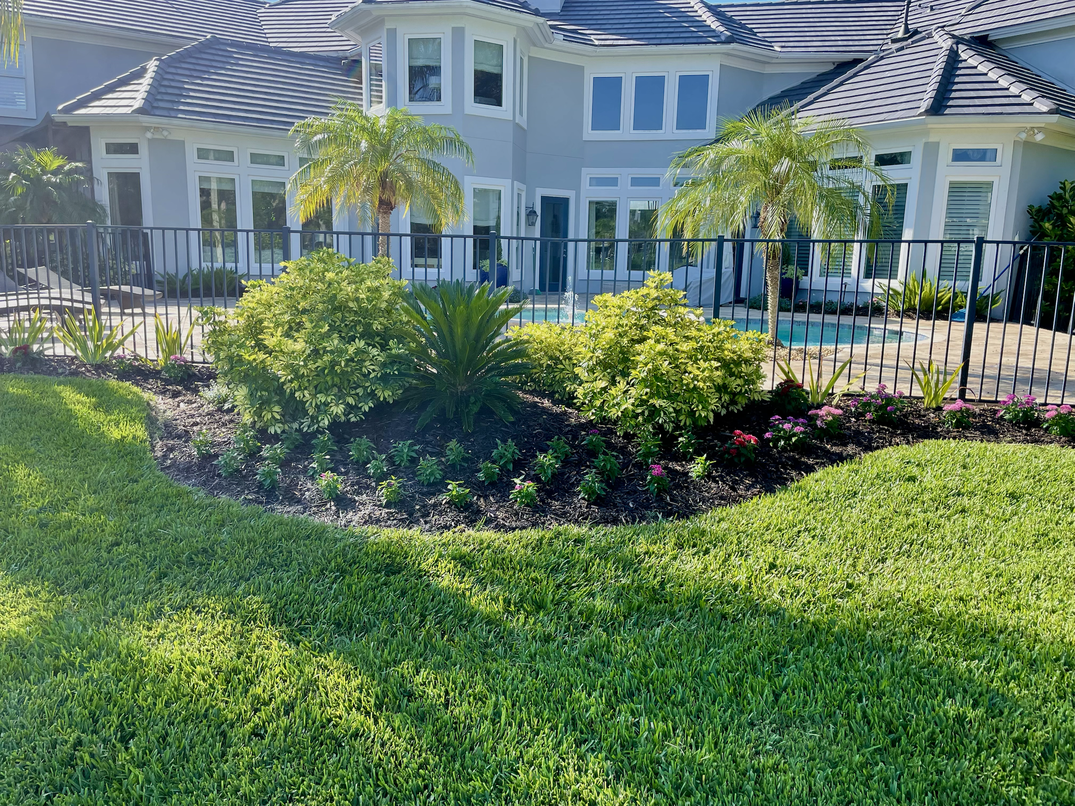 Poolside landscape bed installation