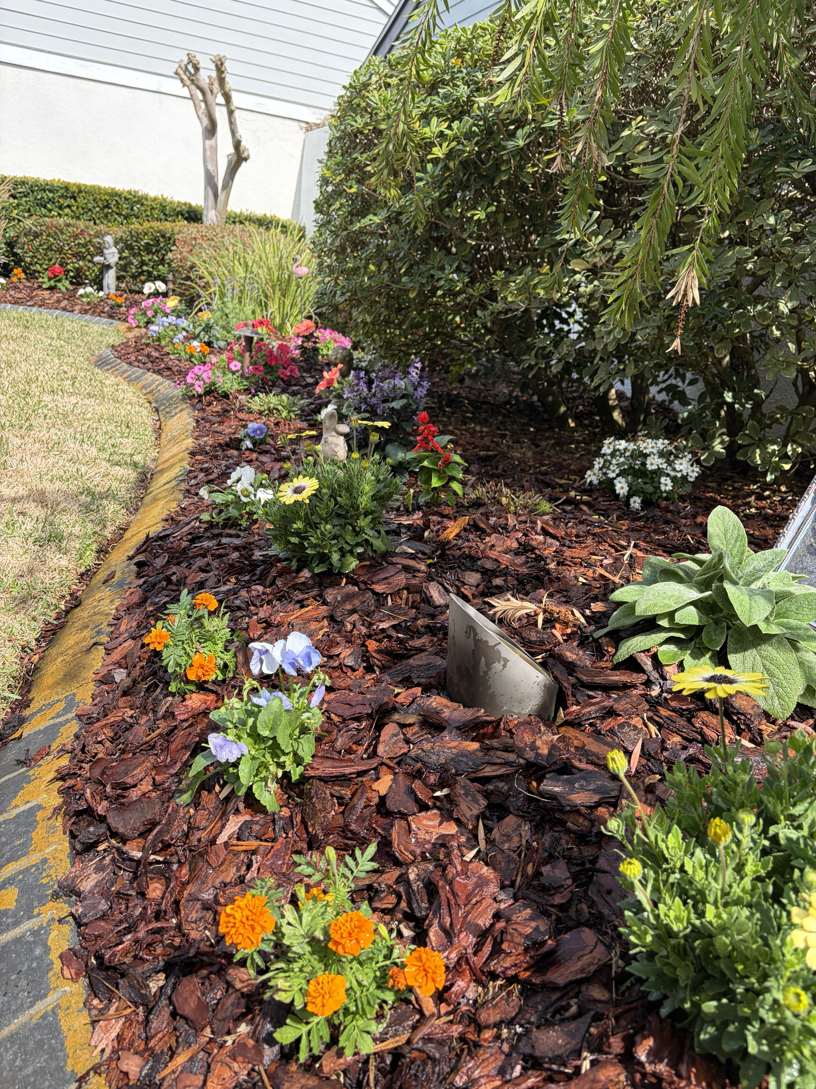 Curved seasonal flower bed detail