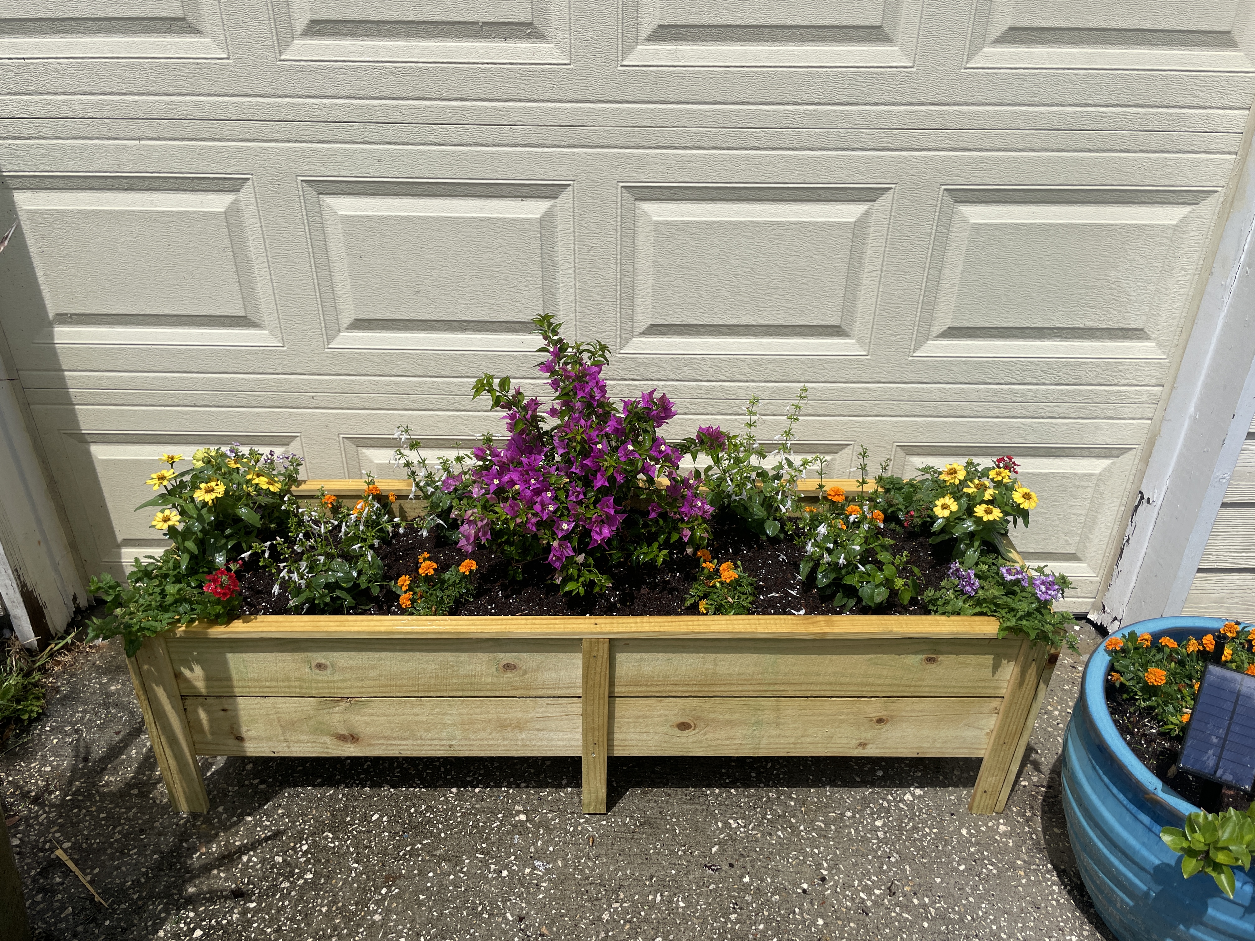 Custom raised planter box installation
